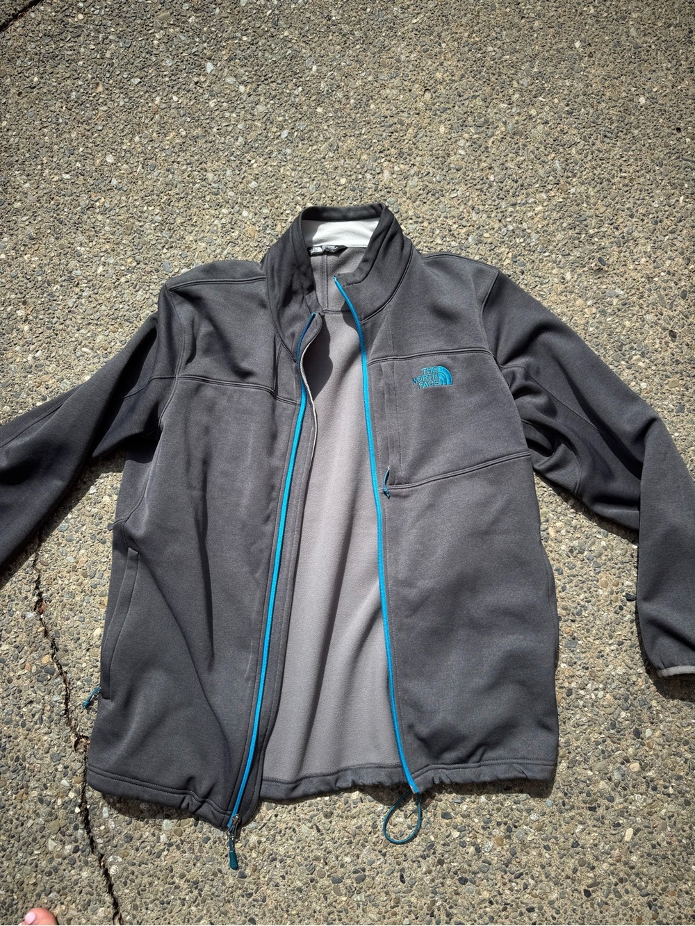The North Face Men’s Gray Apex Bionic Softshell Jacket with Blue Zipper